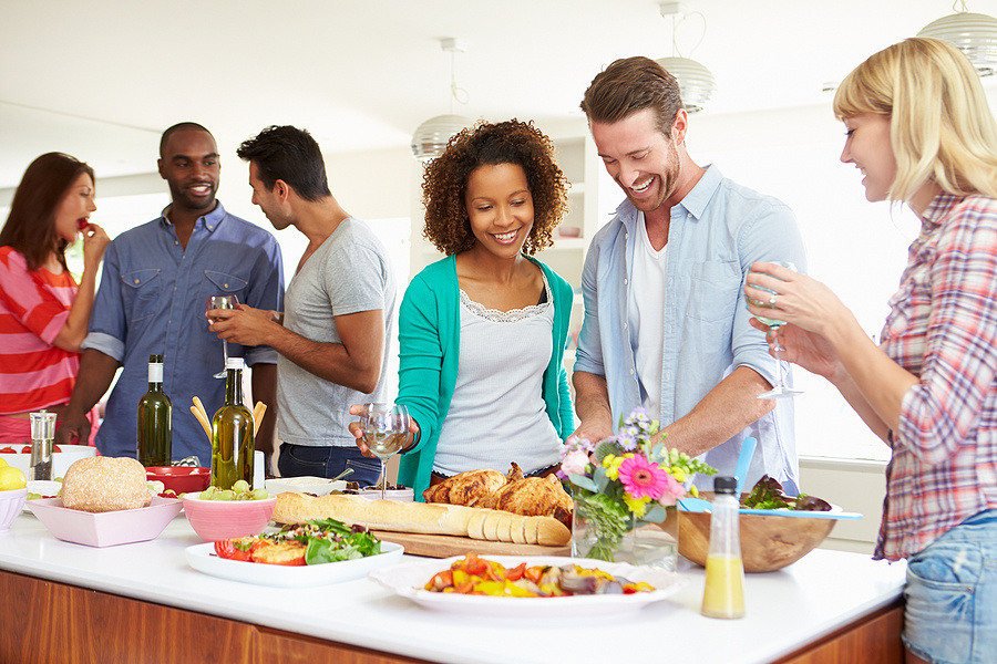 bigstock-Group-Of-Friends-Having-Dinner-55015268